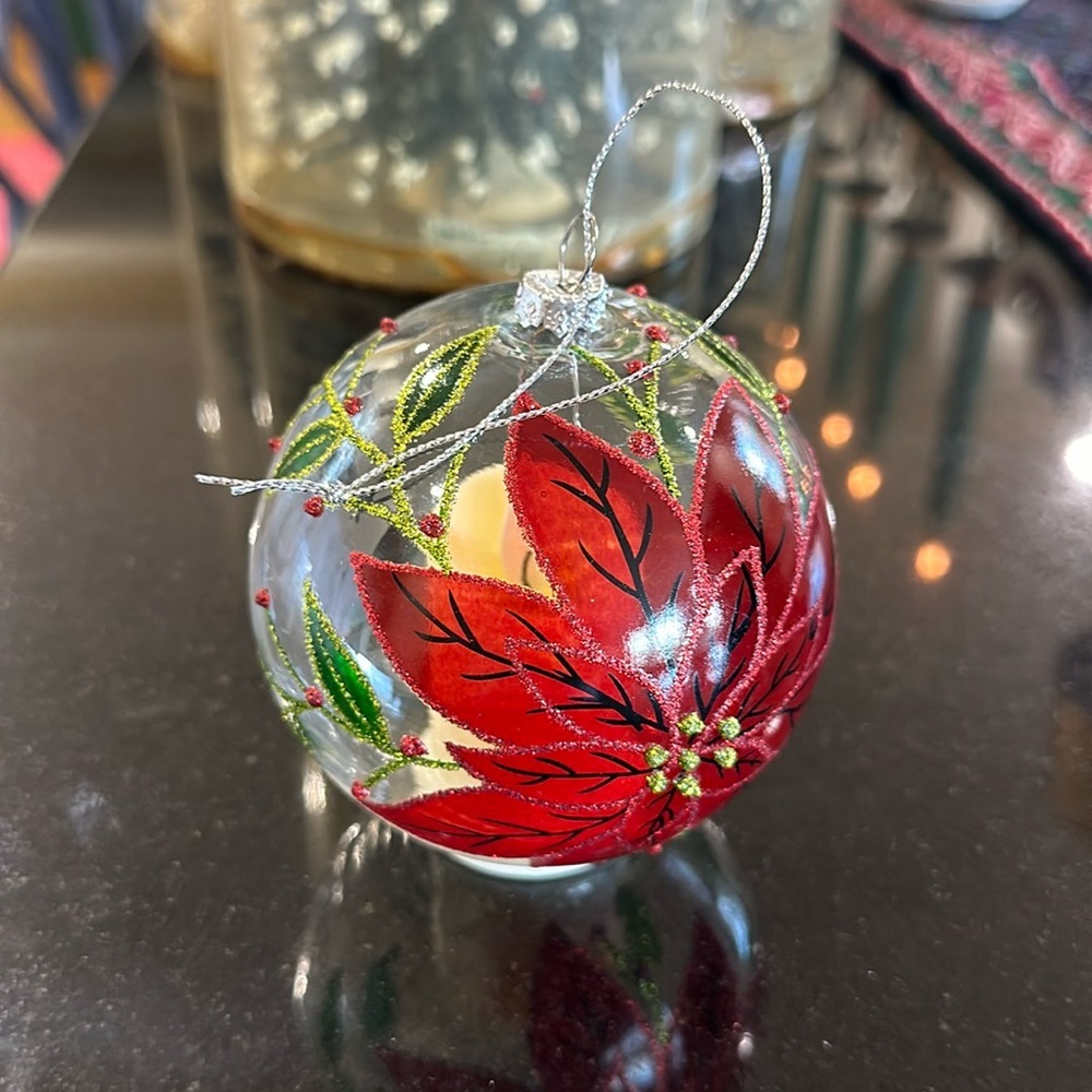 Christmas tree ornament with poinsettias design